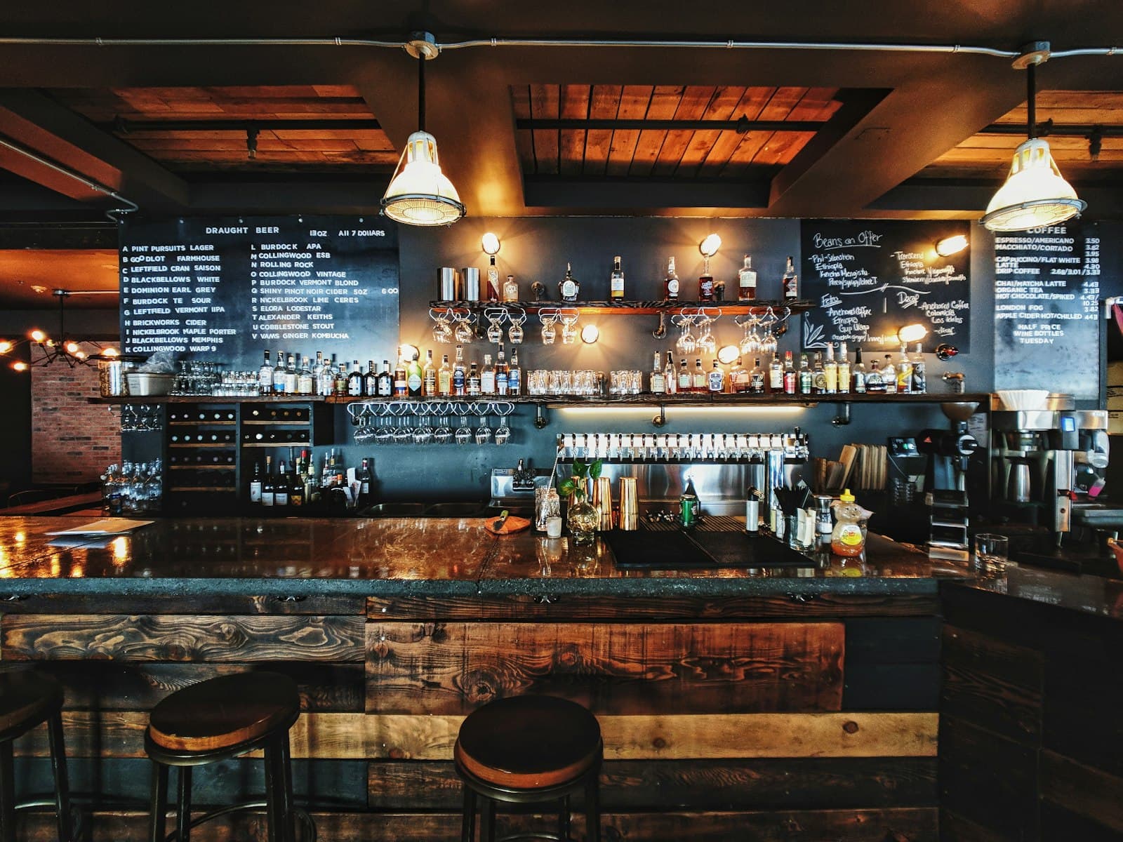 The amber-lit bar at Ember & Vine